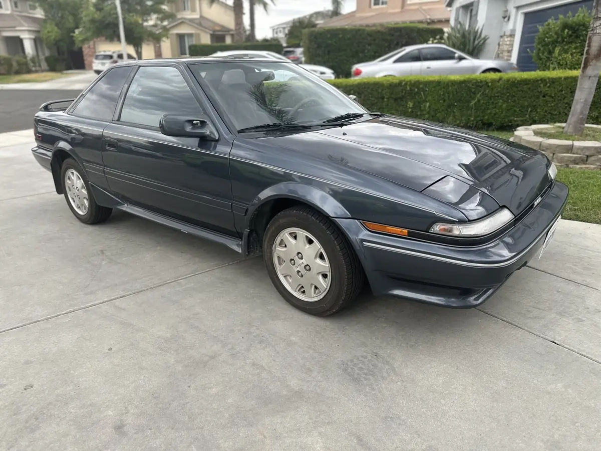 A used car checked at the seller's driveway.