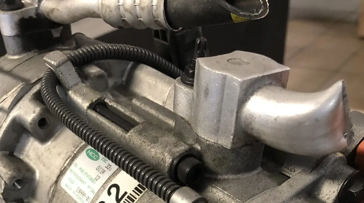 Same compressor, port block and clutch side.