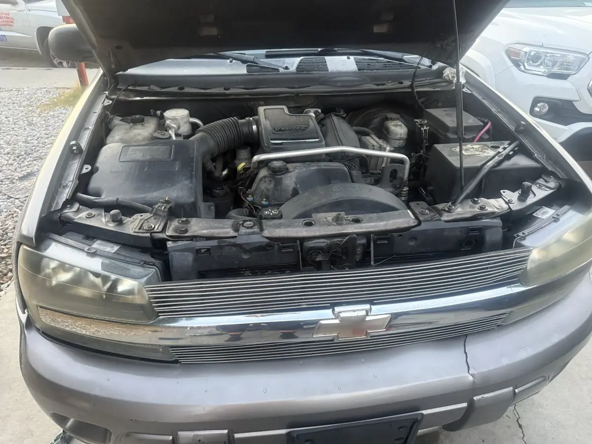 Inline six bay, hood up, ready for service.