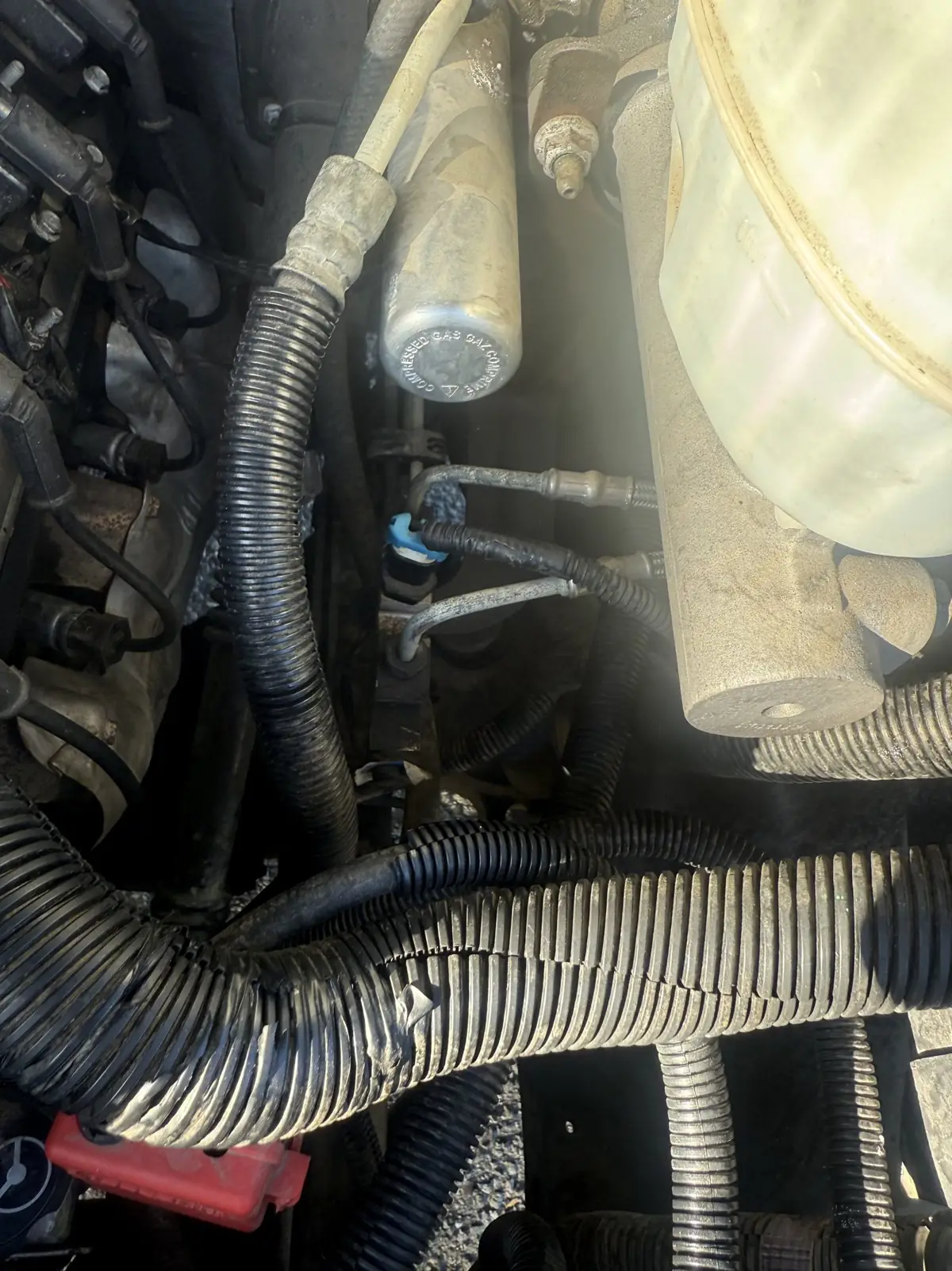 Coolant reservoir and loom on a cooling job.